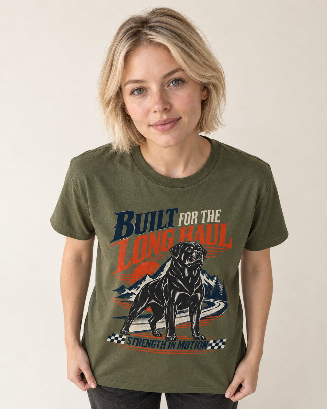 Built for the Long Haul Rottweiler Strength in Motion T-Shirt in Heather Military Green, worn by a model