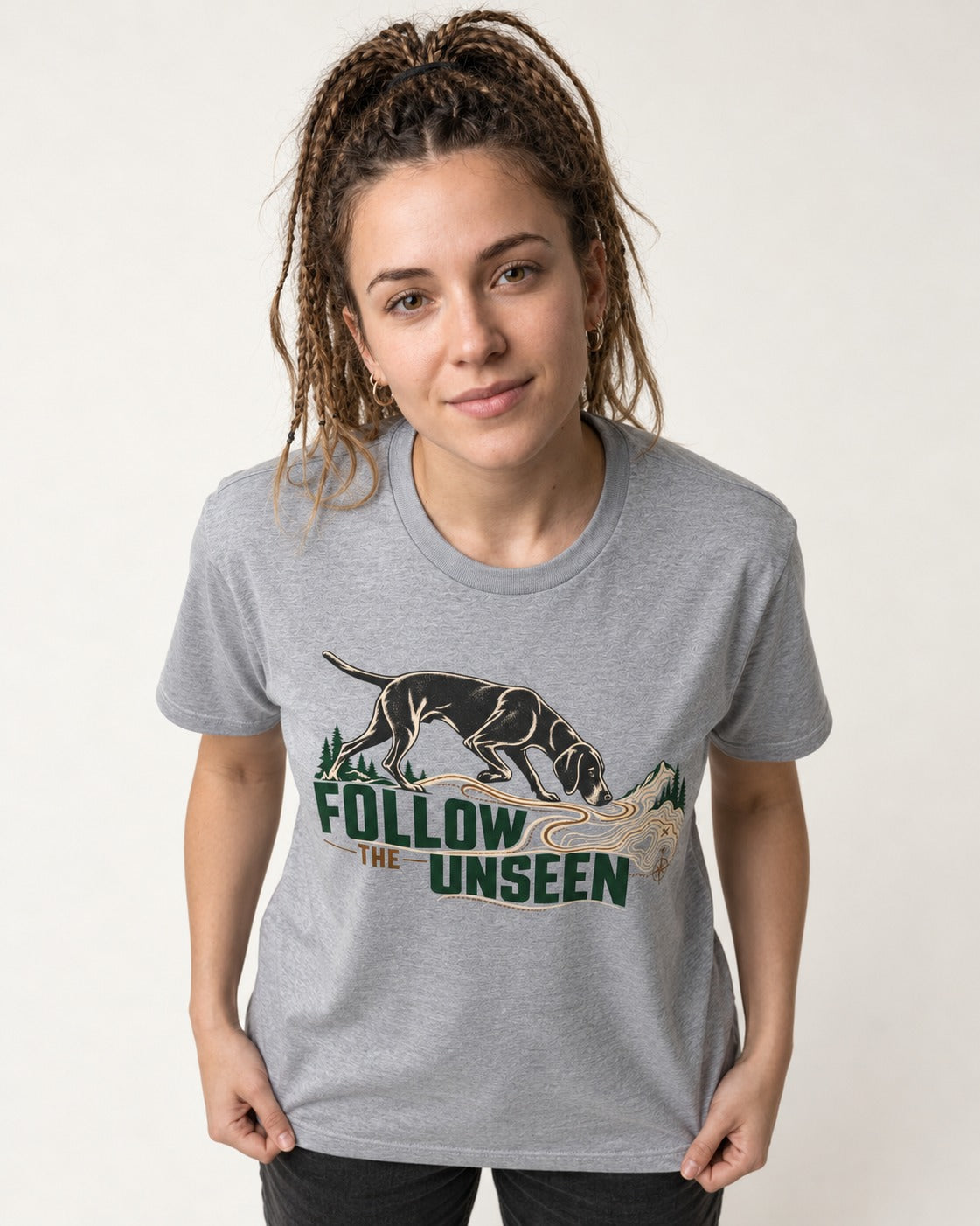 Follow the Unseen German Shorthaired Pointer T-Shirt in Sport Grey, worn by a model