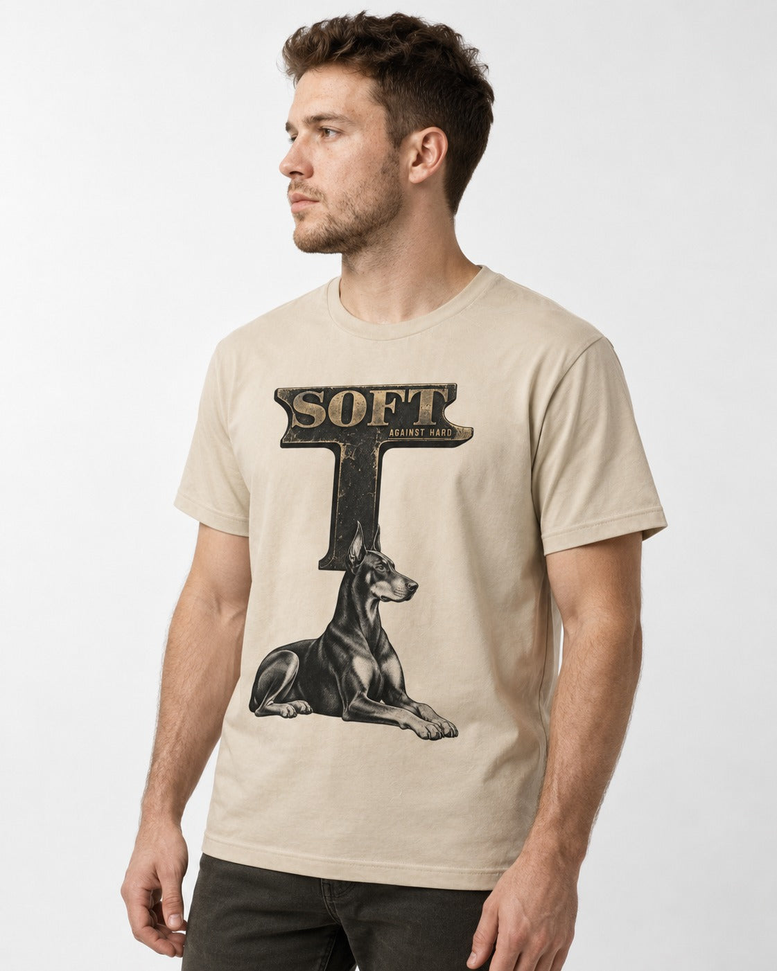 Soft Against Hard Doberman T-Shirt in Sand, worn by a model