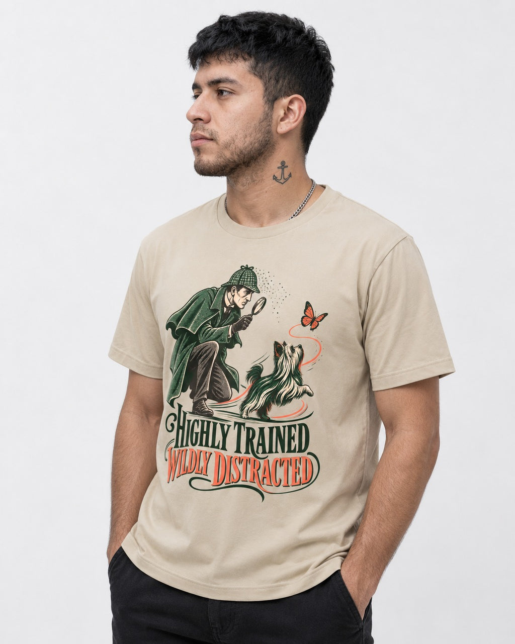 Highly Trained Wildly Distracted Yorkshire Terrier T-Shirt in Sand, worn by a model