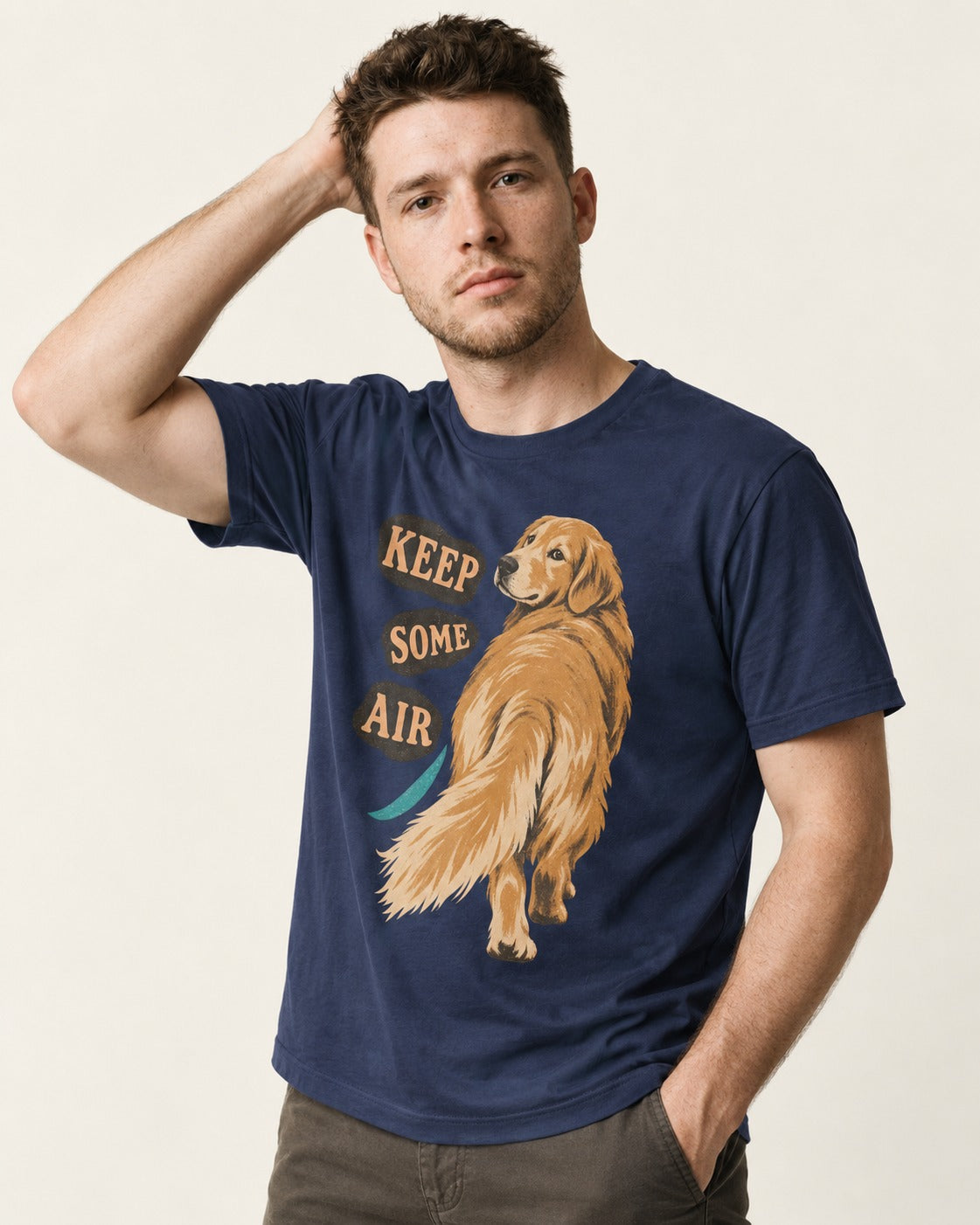 Golden Retriever Keep Some Air Looking Back Graphic T-Shirt in Navy, worn by a model