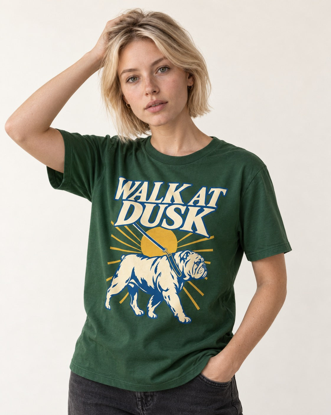 English Bulldog Walk at Dusk Sunset Graphic T-Shirt in Forest Green, worn by a model