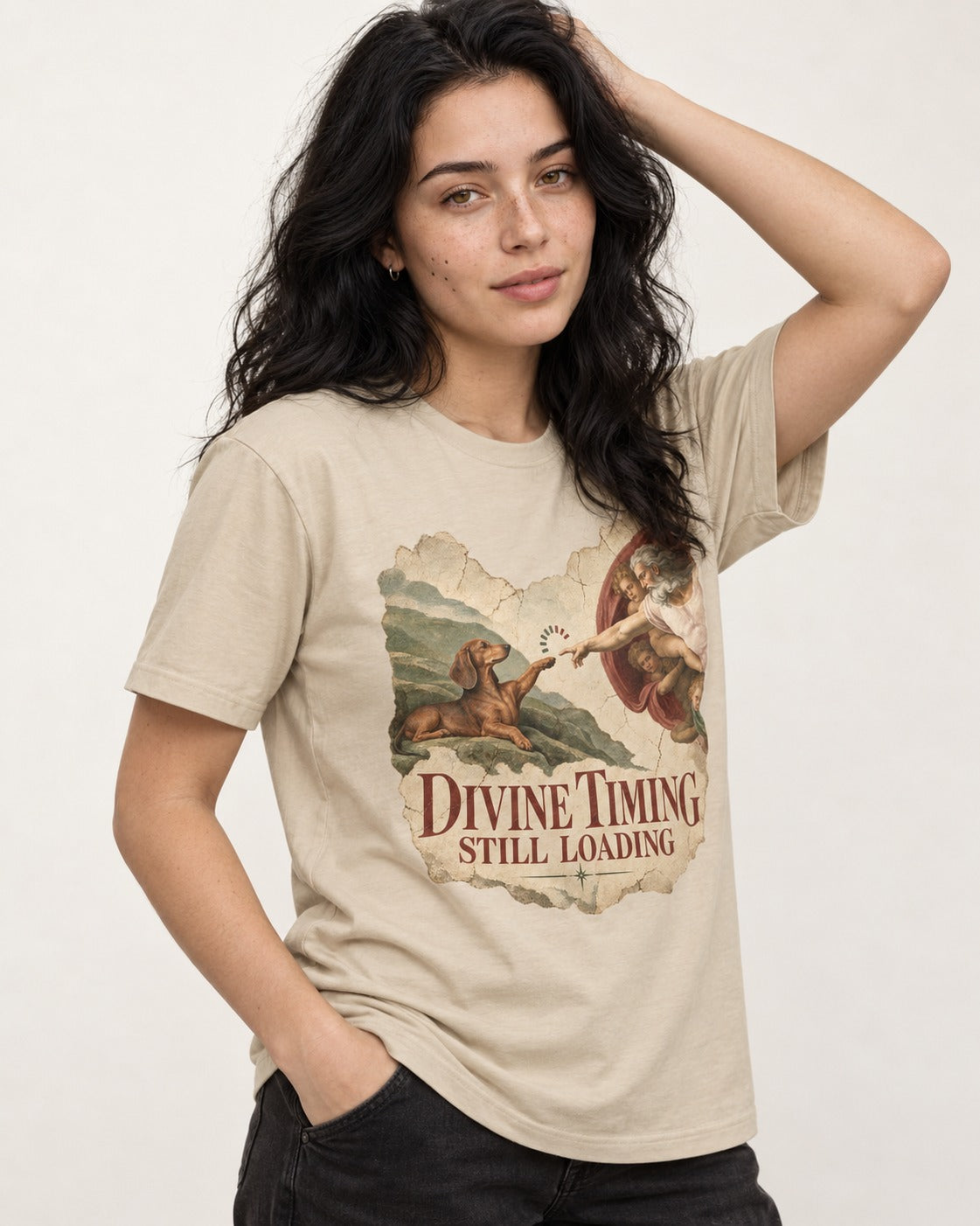 Dachshund's Divine Timing T-Shirt in Sand, worn by a model