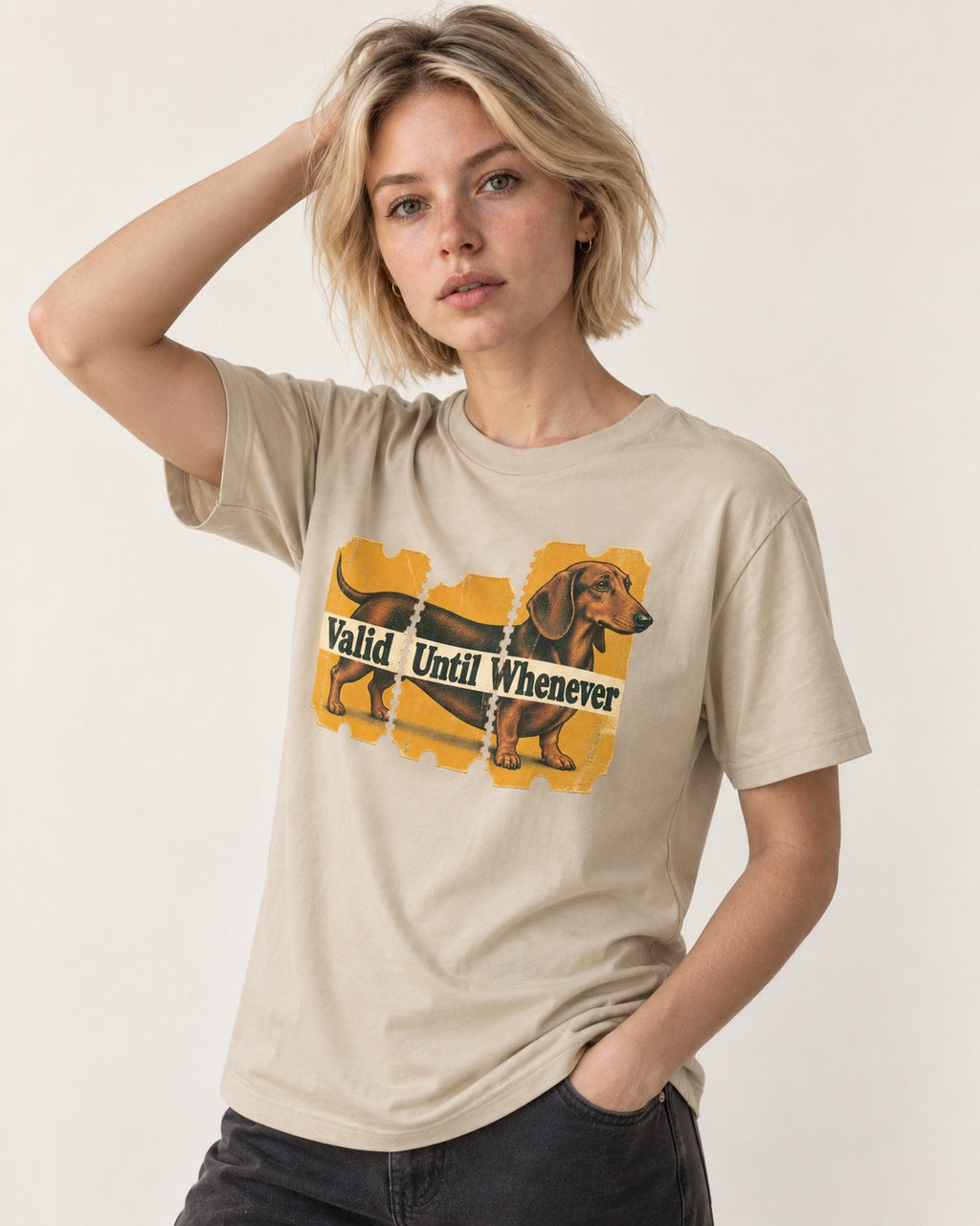 Dachshund Valid Until Whenever T-Shirt in Sand, worn by a model