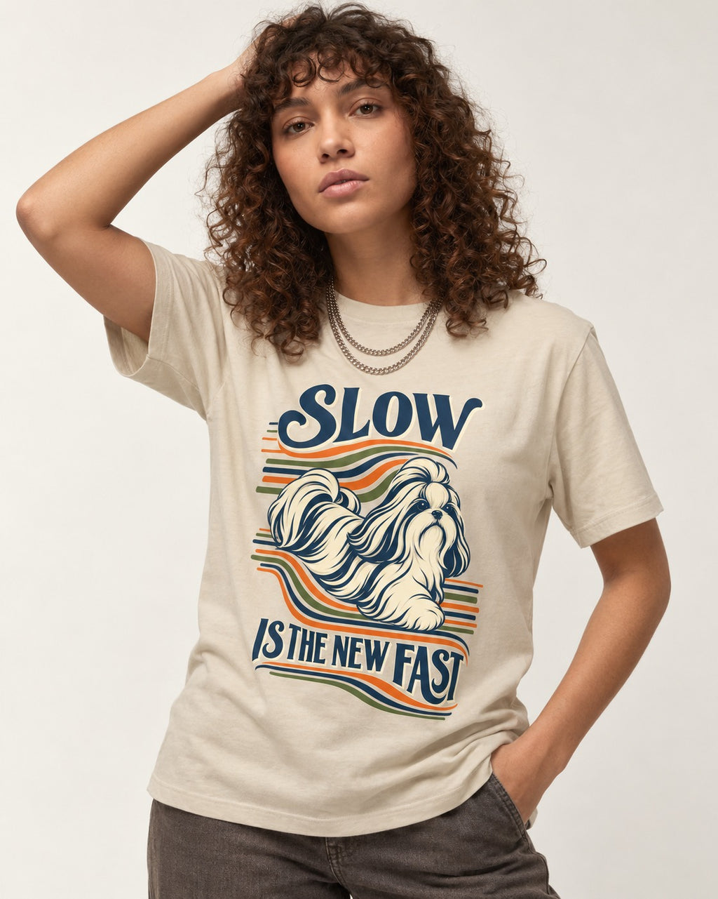Slow Is Fast Shih Tzu T-Shirt in Sand, worn by a model