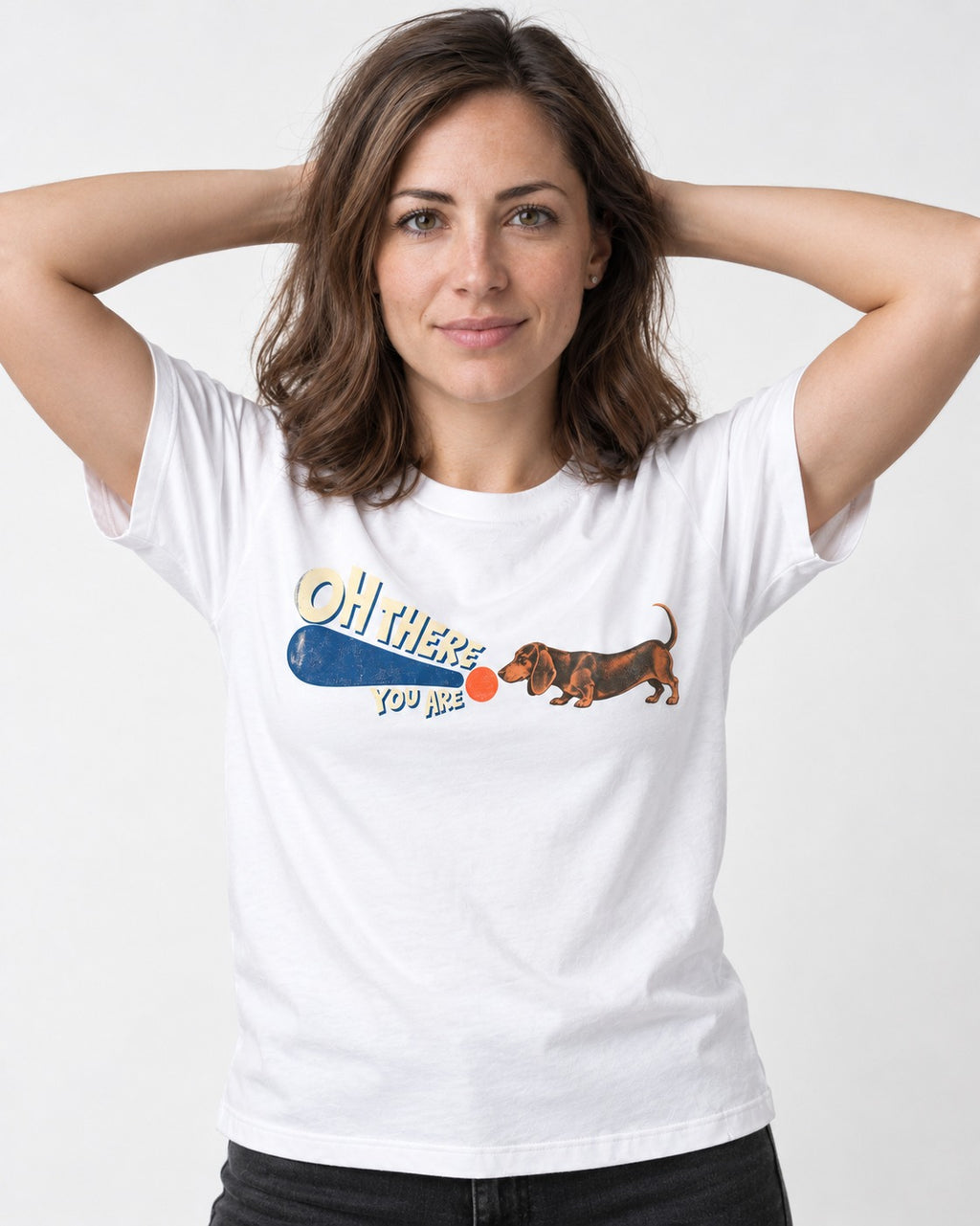 Dachshund Oh There You Are Ball Graphic T-Shirt in White, worn by a model