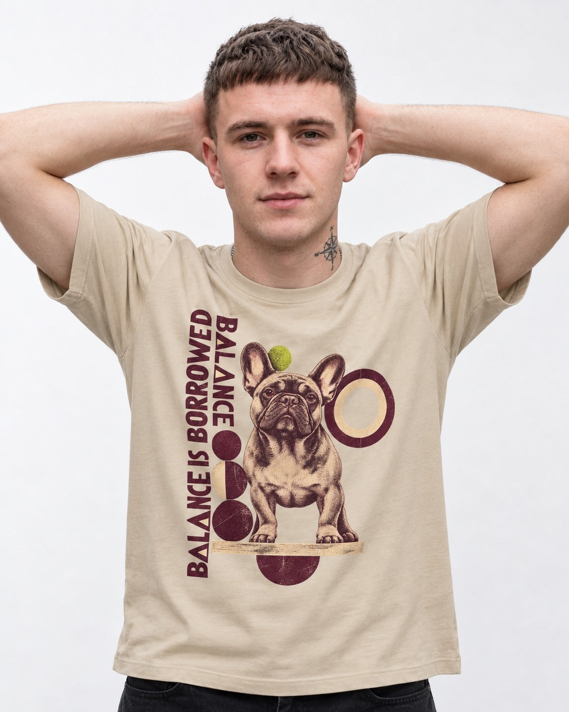 Frenchie's Balance Is Borrowed T-Shirt in Sand, worn by a model