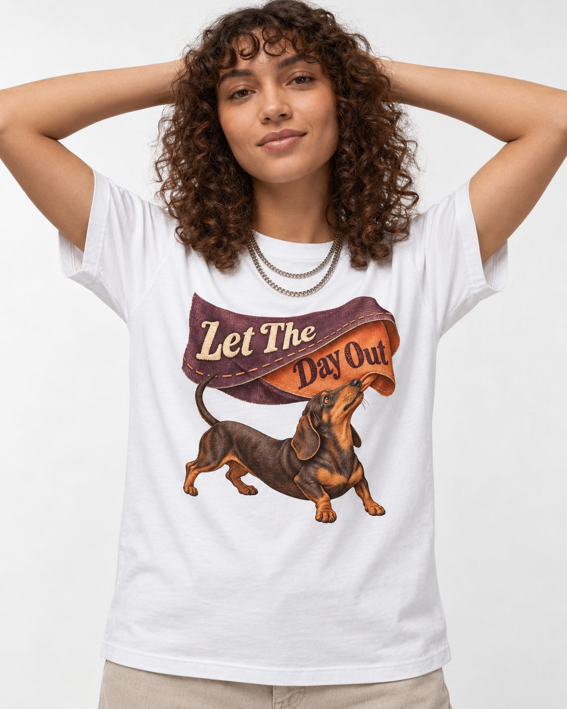 Dachshund Let The Day Out Fabric Banner Graphic T-Shirt in White, worn by a model