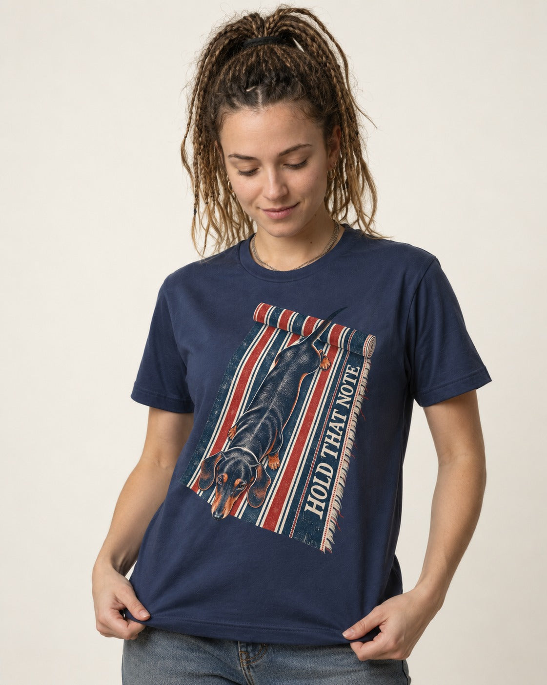 Dachshund Hold That Note Striped Rug Graphic T-Shirt in Navy, worn by a model