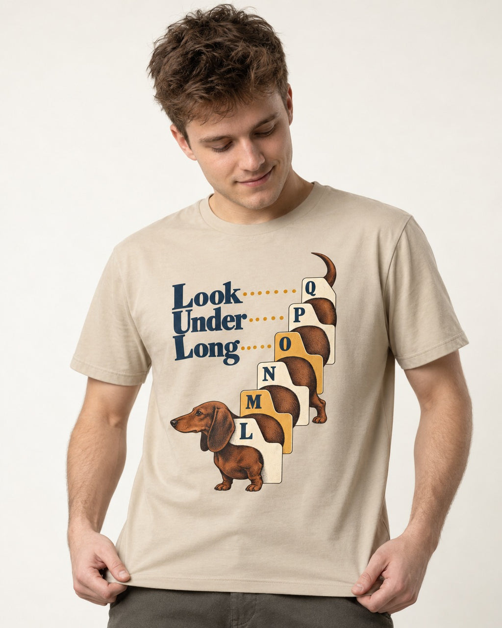 Look Under Long Dachshund T-Shirt in Sand, worn by a model