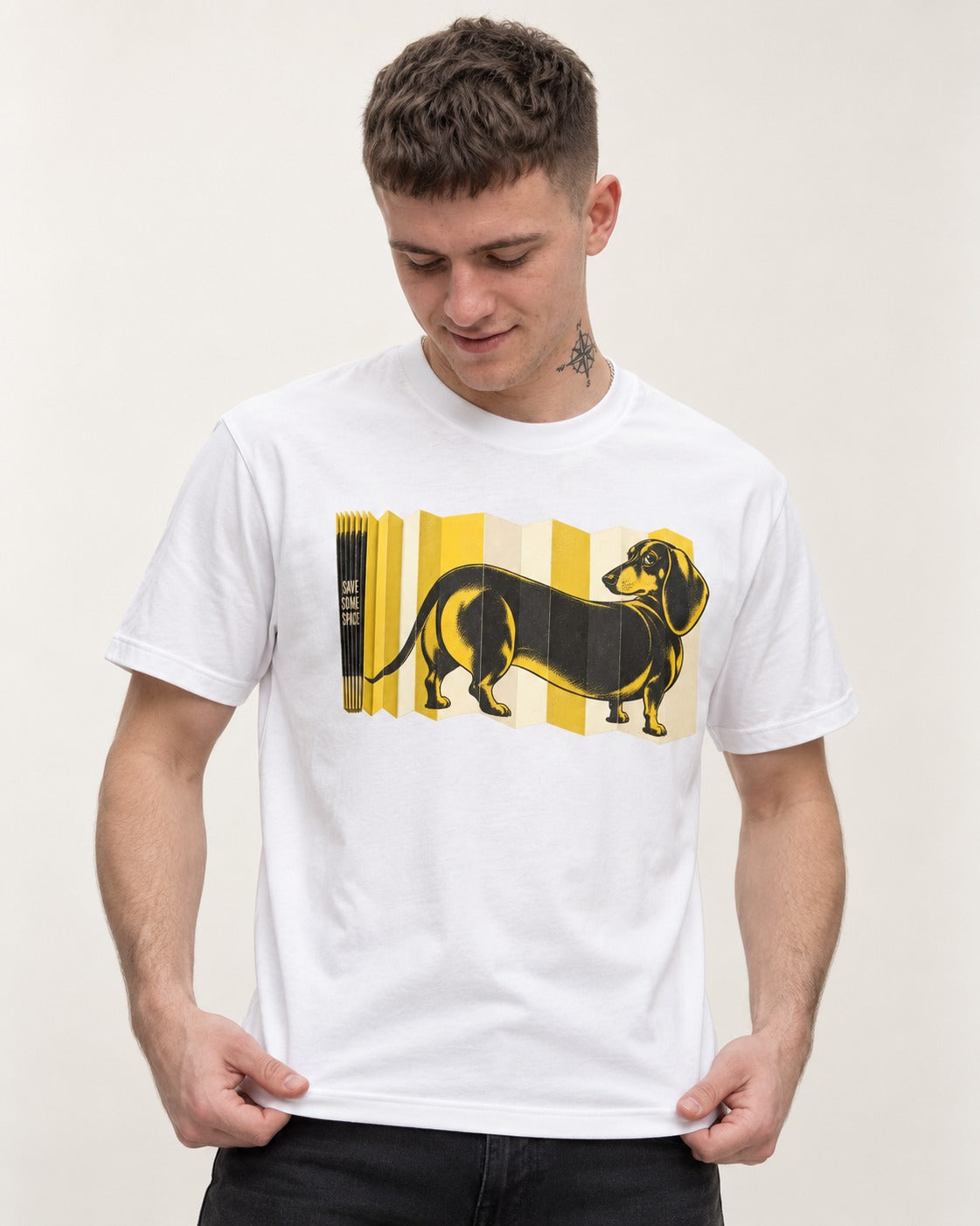Dachshund Save Some Space Accordion Screen Graphic T-Shirt in White, worn by a model