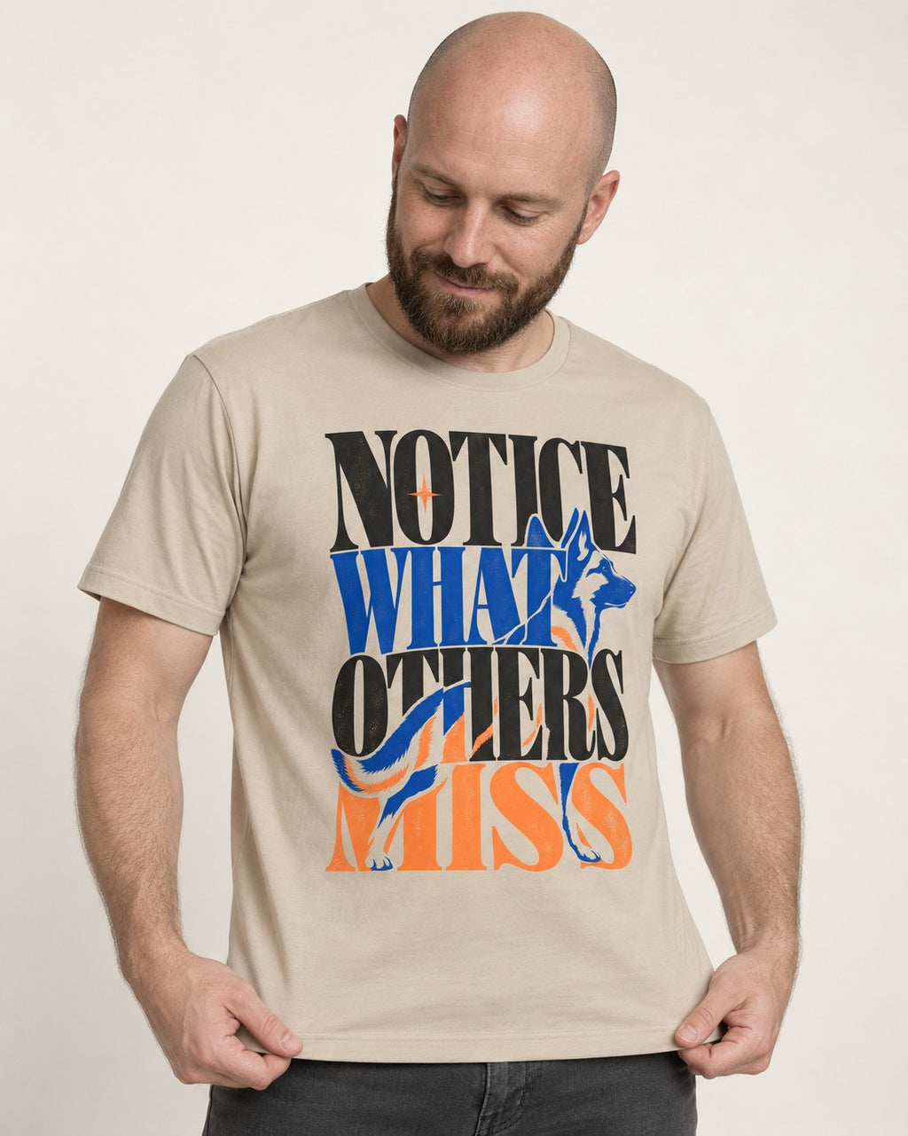 Notice What Others Miss German Shepherd Dog T-Shirt in Sand, worn by a model