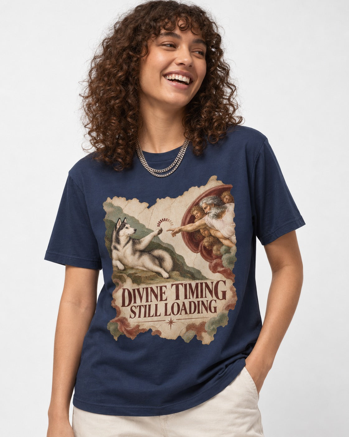Husky Divine Timing Still Loading Creation Parody Graphic T-Shirt in Navy, worn by a model