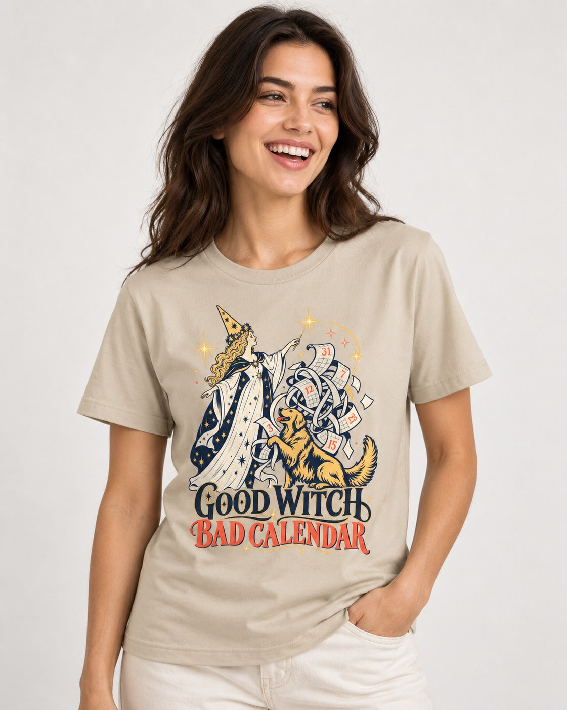 Good Witch Bad Calendar Golden Retriever T-Shirt in Sand, worn by a model