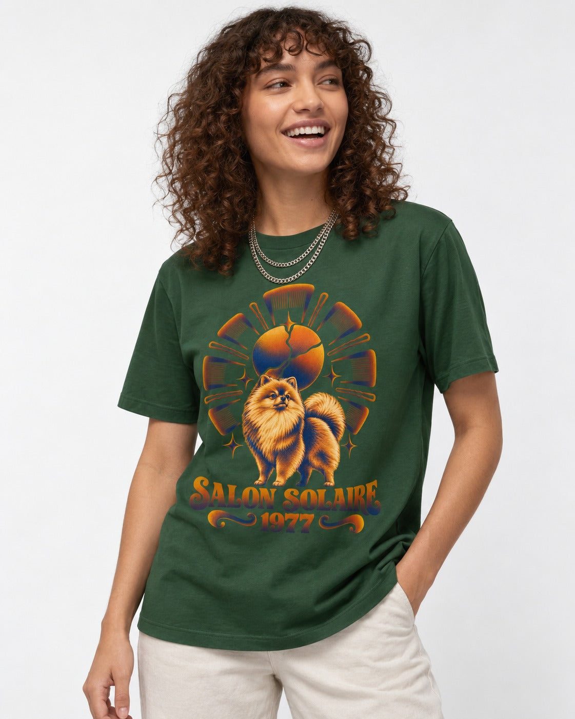 Pomeranian Salon Solaire 1977 Hairbrush Halo Graphic T-Shirt in Forest Green, worn by a model