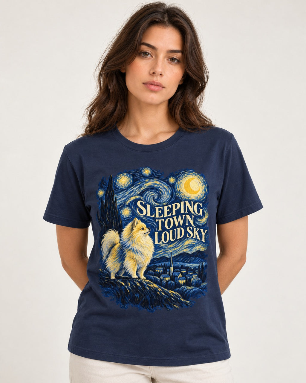 Pomeranian Sleeping Town Loud Sky Starry Night Graphic T-Shirt in Navy, worn by a model