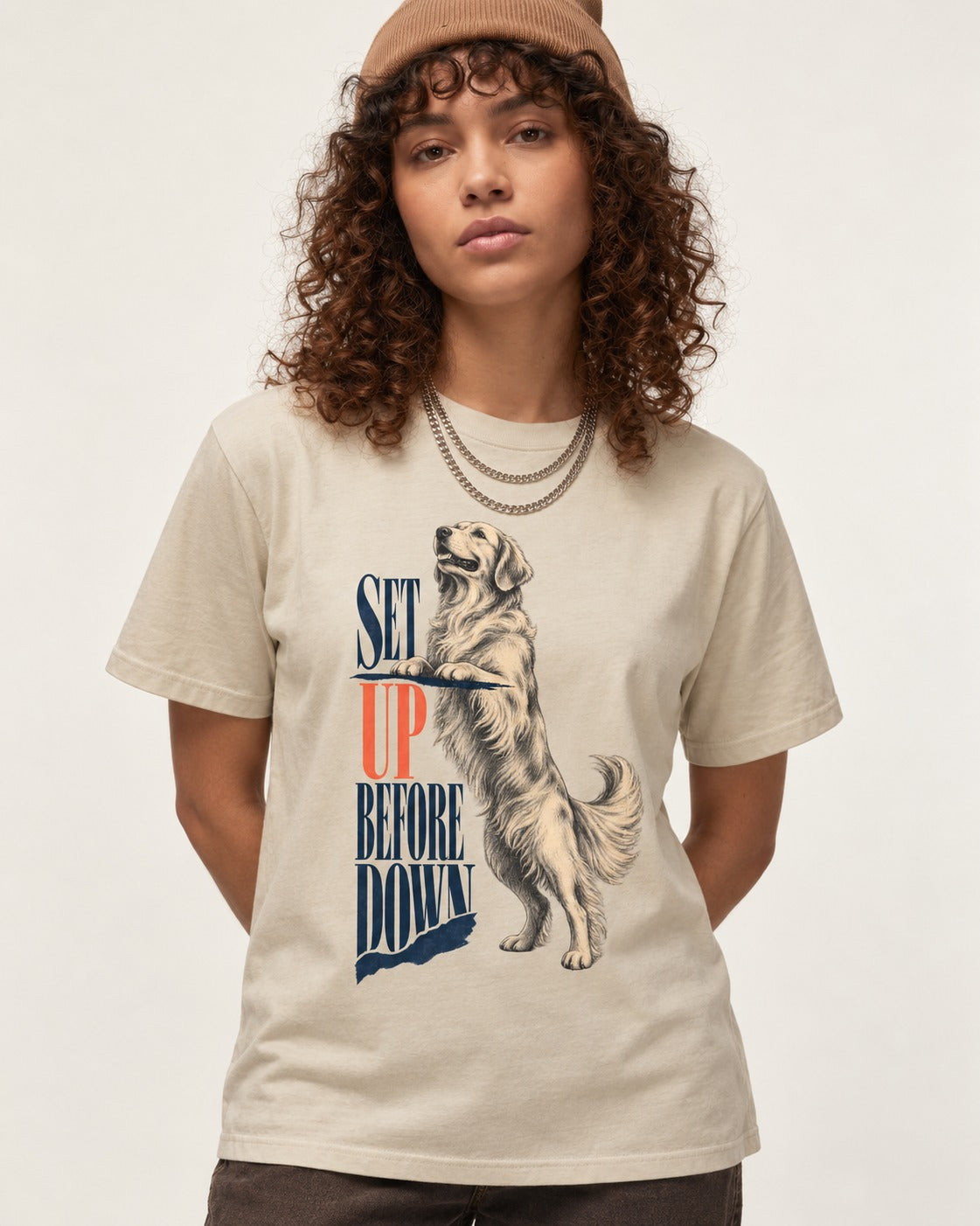 Golden Retriever Set Up Before Down T-Shirt in Sand, worn by a model