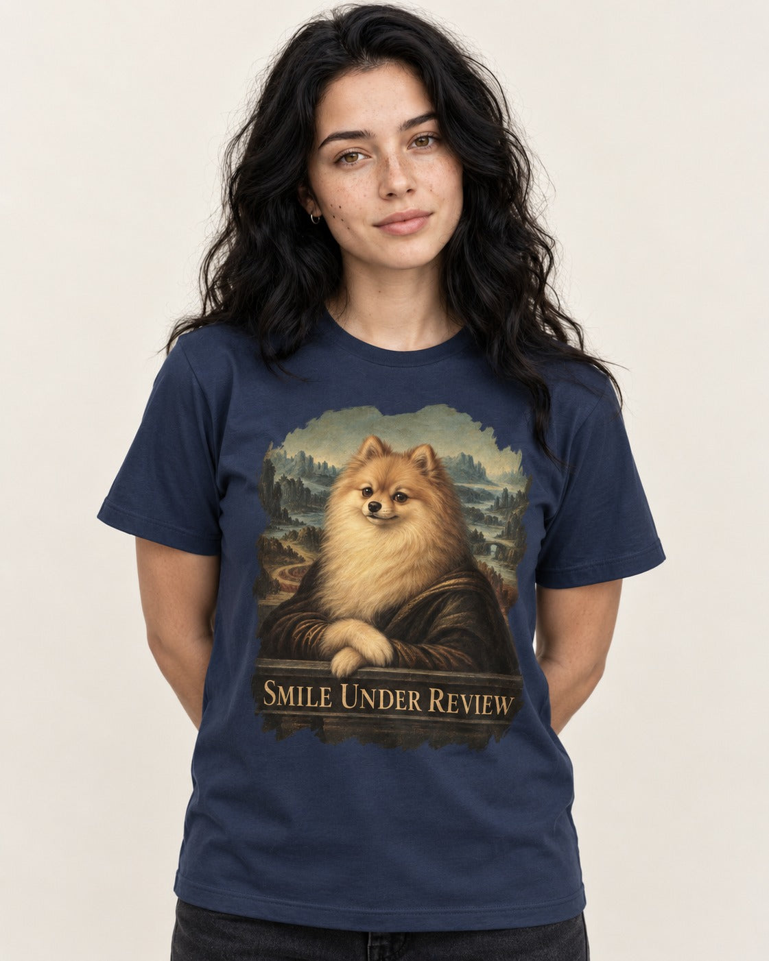 Pomeranian Smile Under Review Renaissance Portrait Graphic T-Shirt in Navy, worn by a model