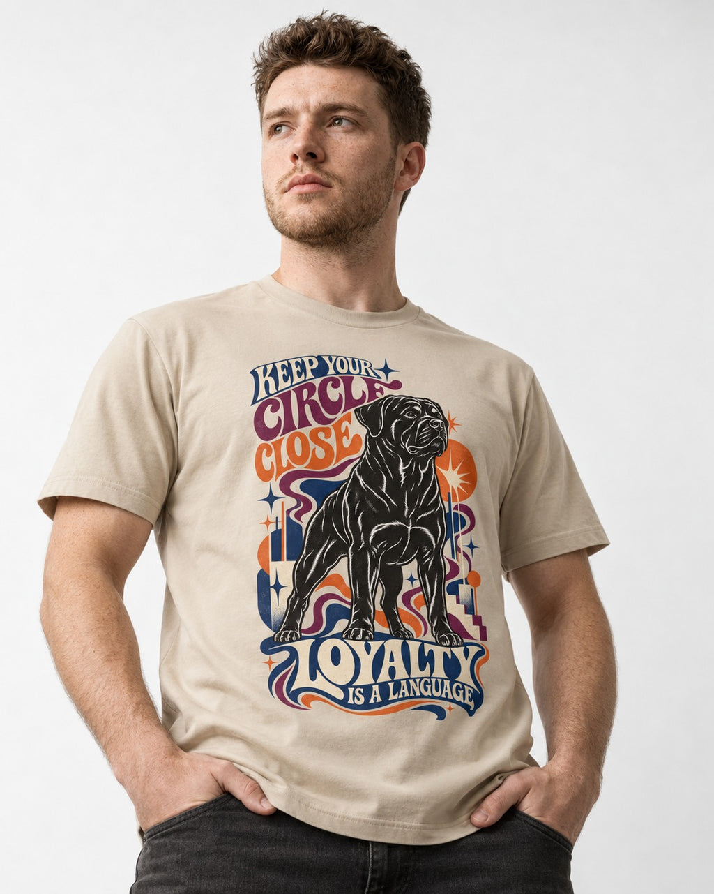 Keep Your Rottweiler Circle Close T-Shirt in Sand, worn by a model