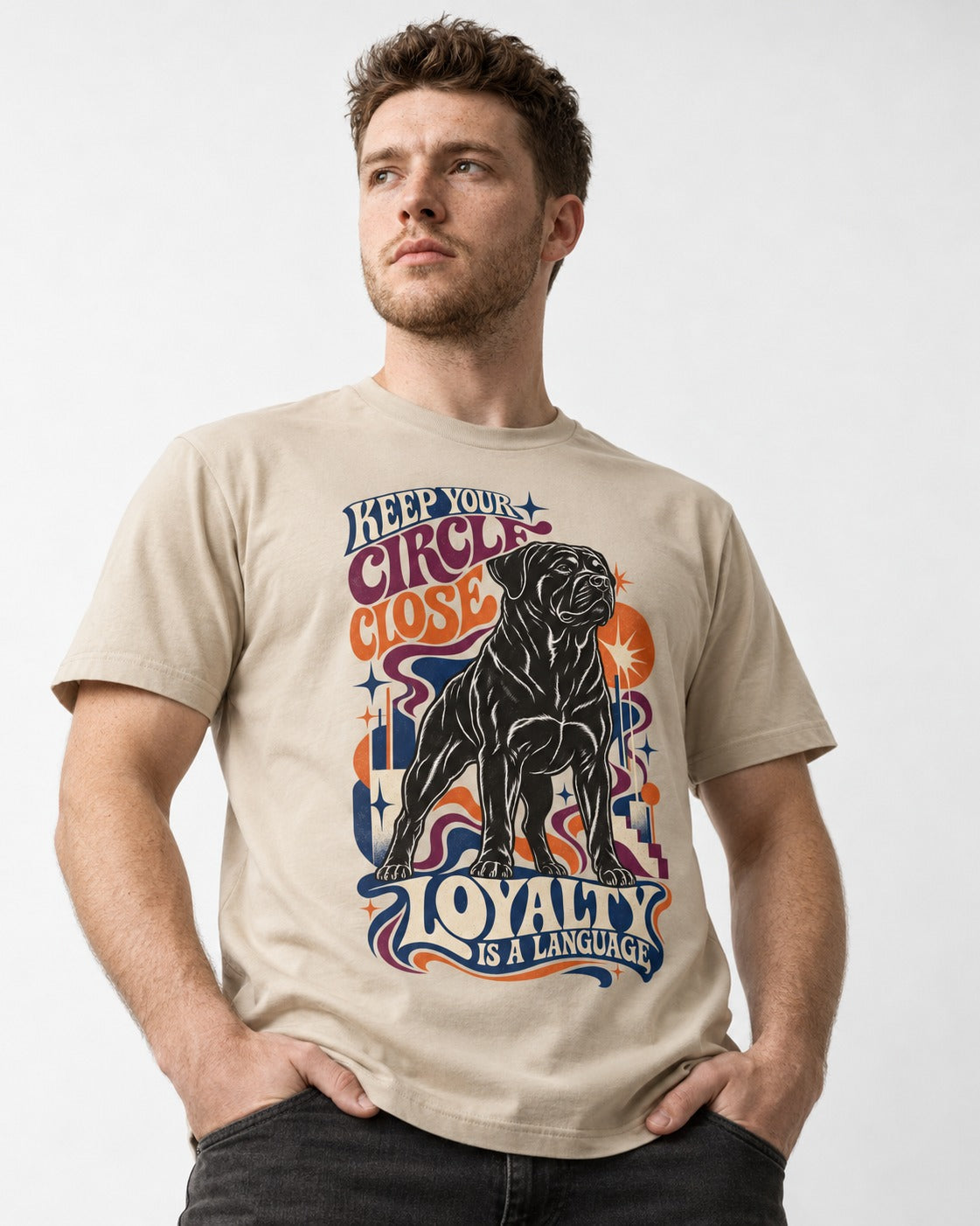 Keep Your Rottweiler Circle Close T-Shirt in Sand, worn by a model