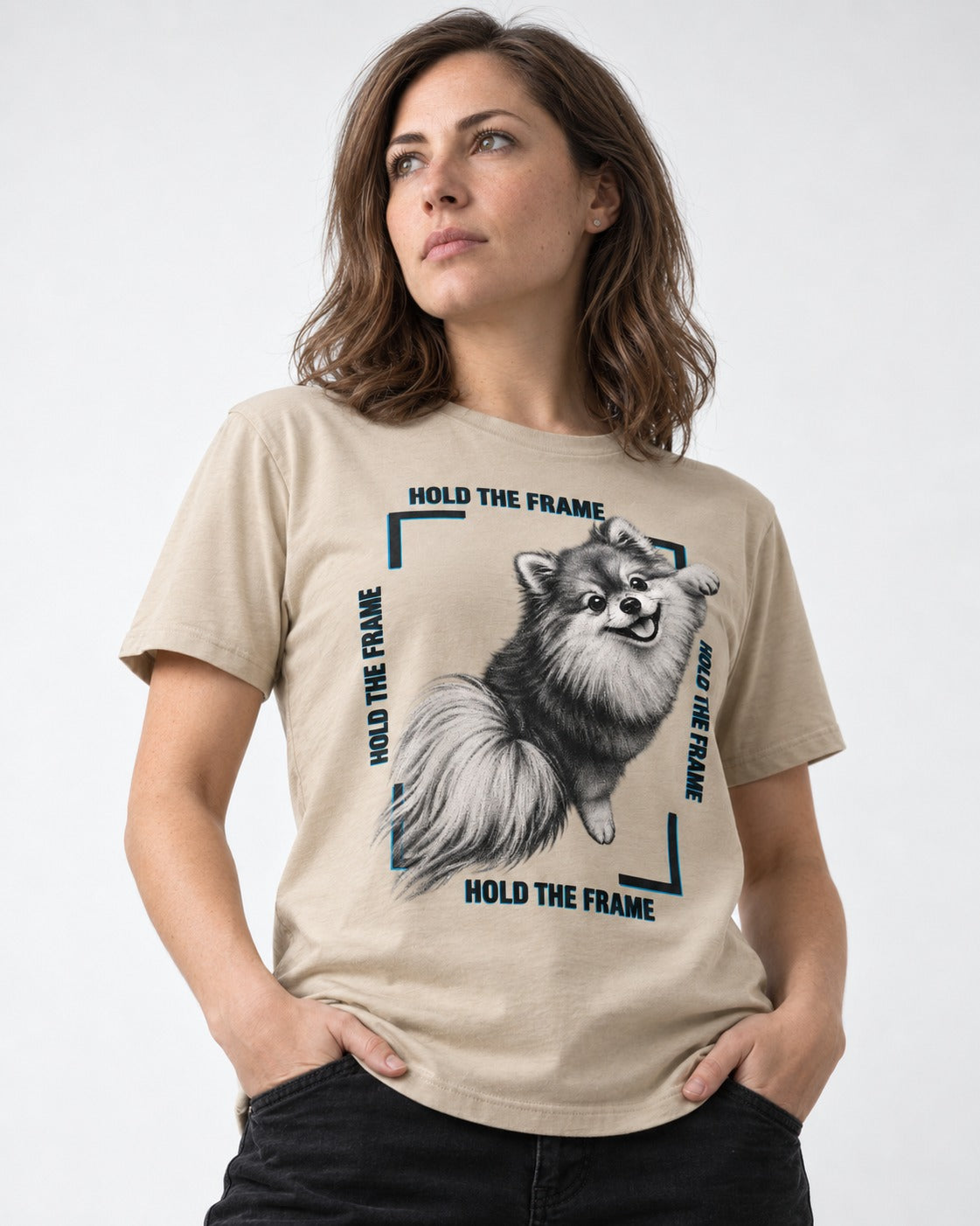Hold the Frame Pomeranian T-Shirt in Sand, worn by a model