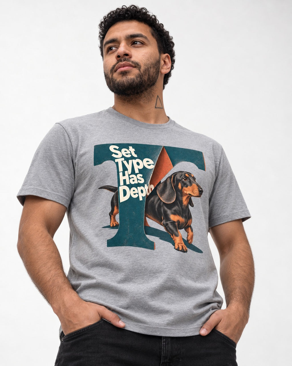 Dachshund Set Type Has Depth Folded Letter Graphic T-Shirt in Sport Grey, worn by a model