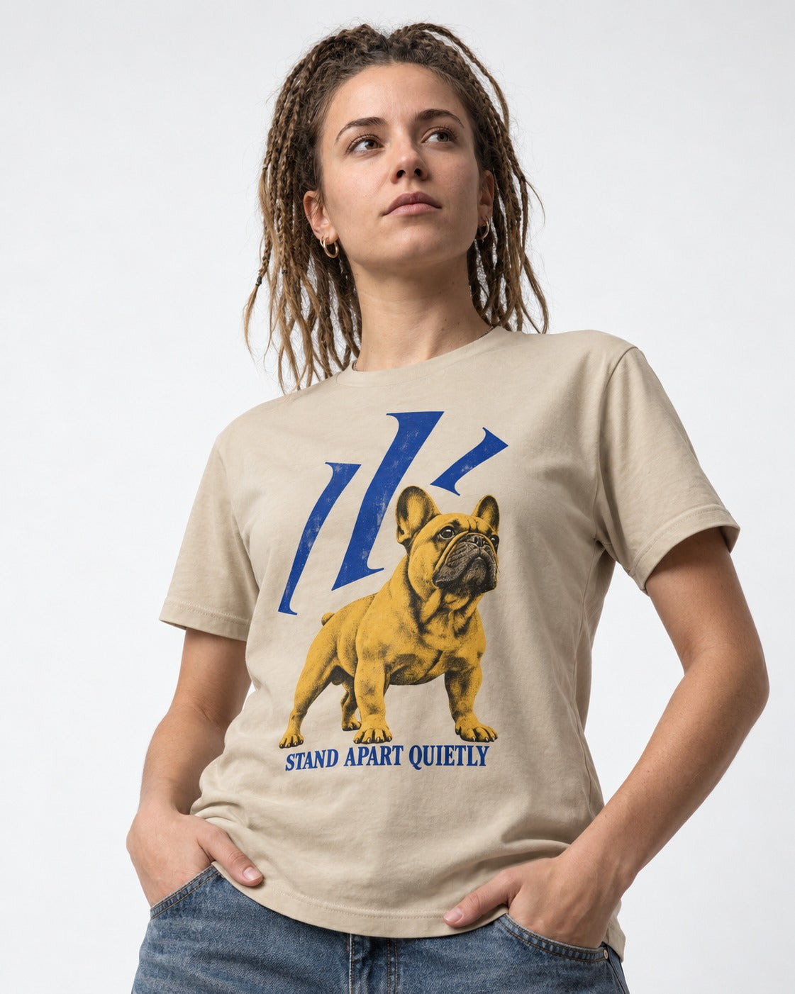 Frenchie Stand Apart Quietly T-Shirt in Sand, worn by a model