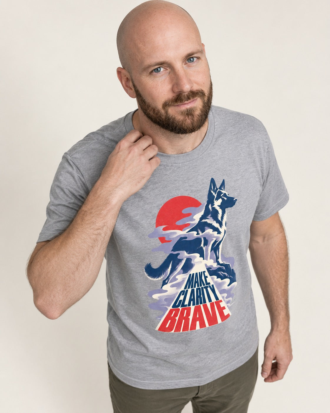 Make Clarity Brave Mountain German Shepherd Dog Graphic T-Shirt in Sport Grey, worn by a model
