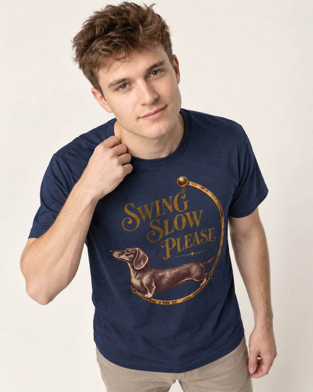 Dachshund Swing Slow Please Necklace Frame Graphic T-Shirt in Navy, worn by a model