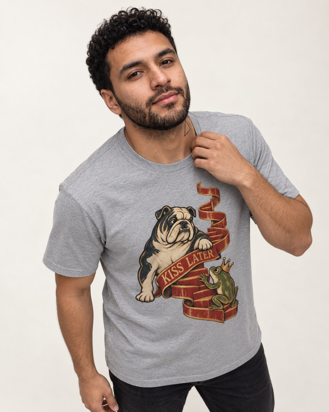 English Bulldog Kiss Later Frog Prince Graphic T-Shirt in Sport Grey, worn by a model