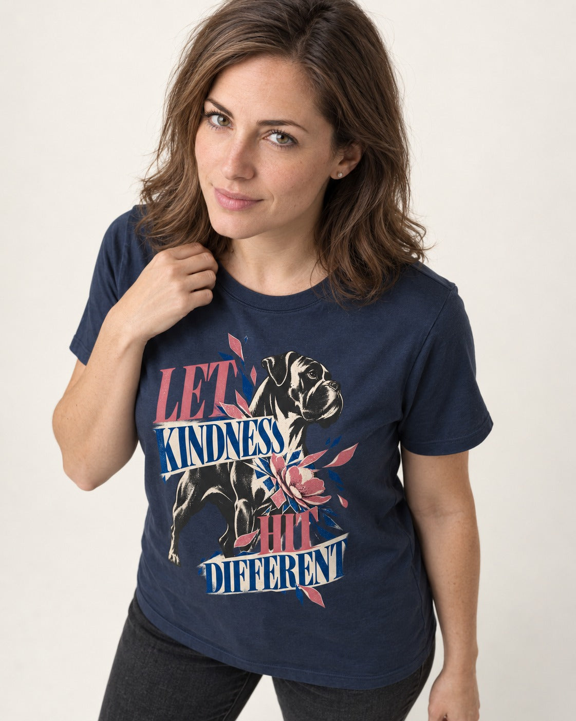 Let Kindness Hit Different Boxer Floral Collage T-Shirt in Navy, worn by a model