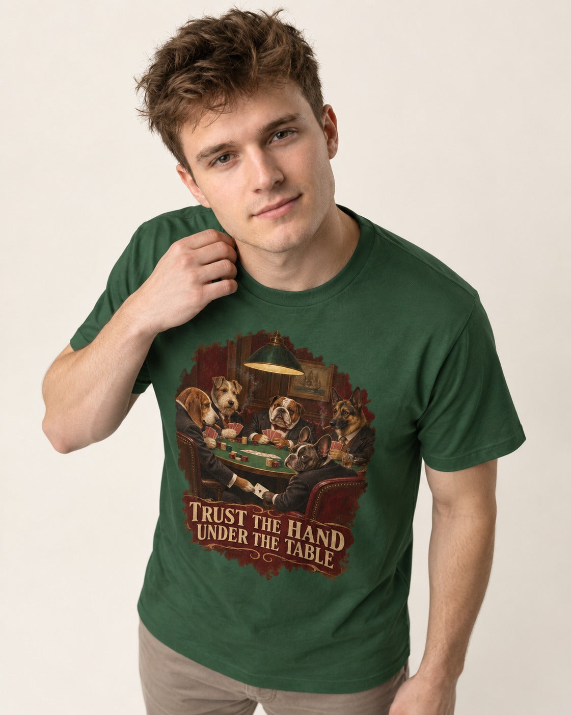 Frenchie Trust the Hand Under the Table Poker Dogs Graphic T-Shirt in Forest Green, worn by a model