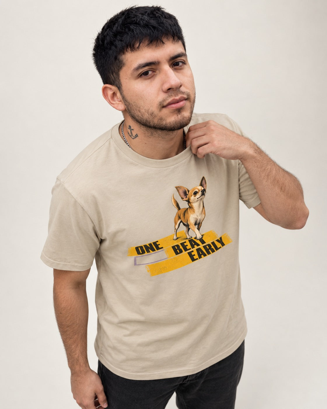 One Beat Early Chihuahua T-Shirt in Sand, worn by a model