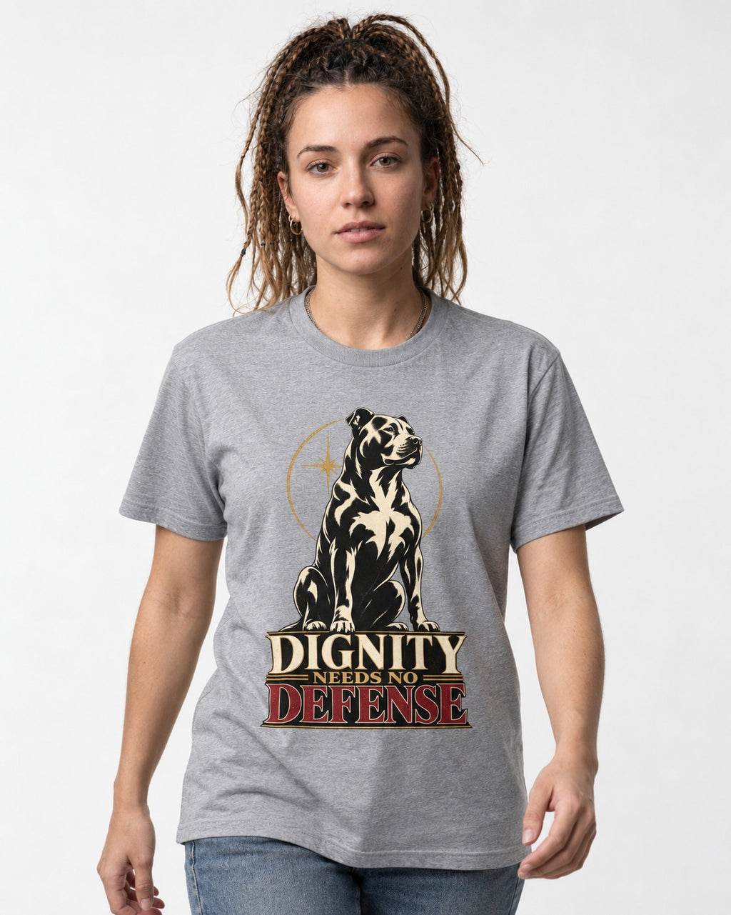 Pitbull Dignity Needs No Defense Seated Emblem Graphic T-Shirt in Sport Grey, worn by a model