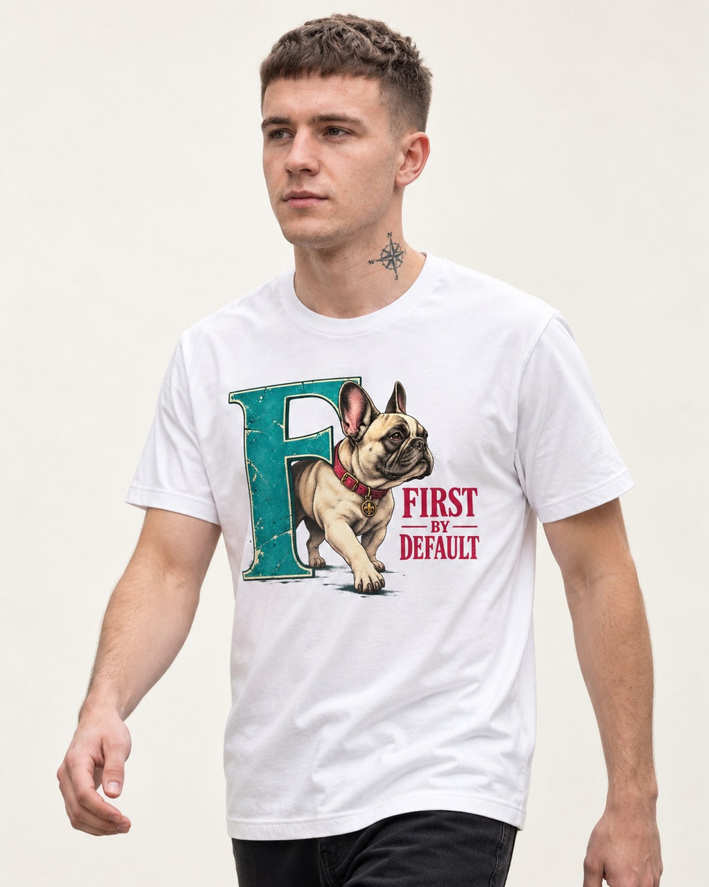 Frenchie First by Default Teal F Graphic T-Shirt in White, worn by a model