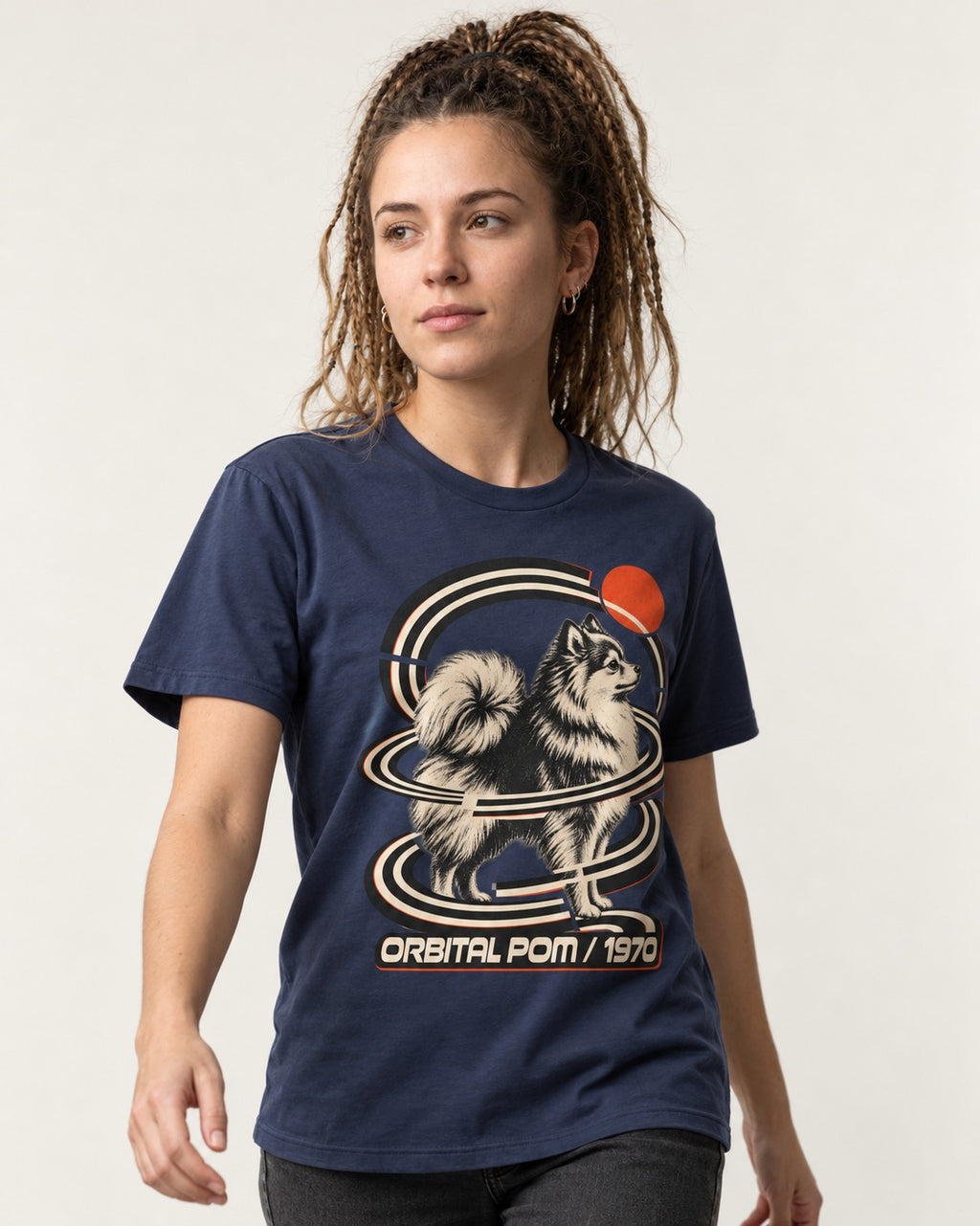 Pomeranian Orbital Pom 1970 Space Age Graphic T-Shirt in Navy, worn by a model