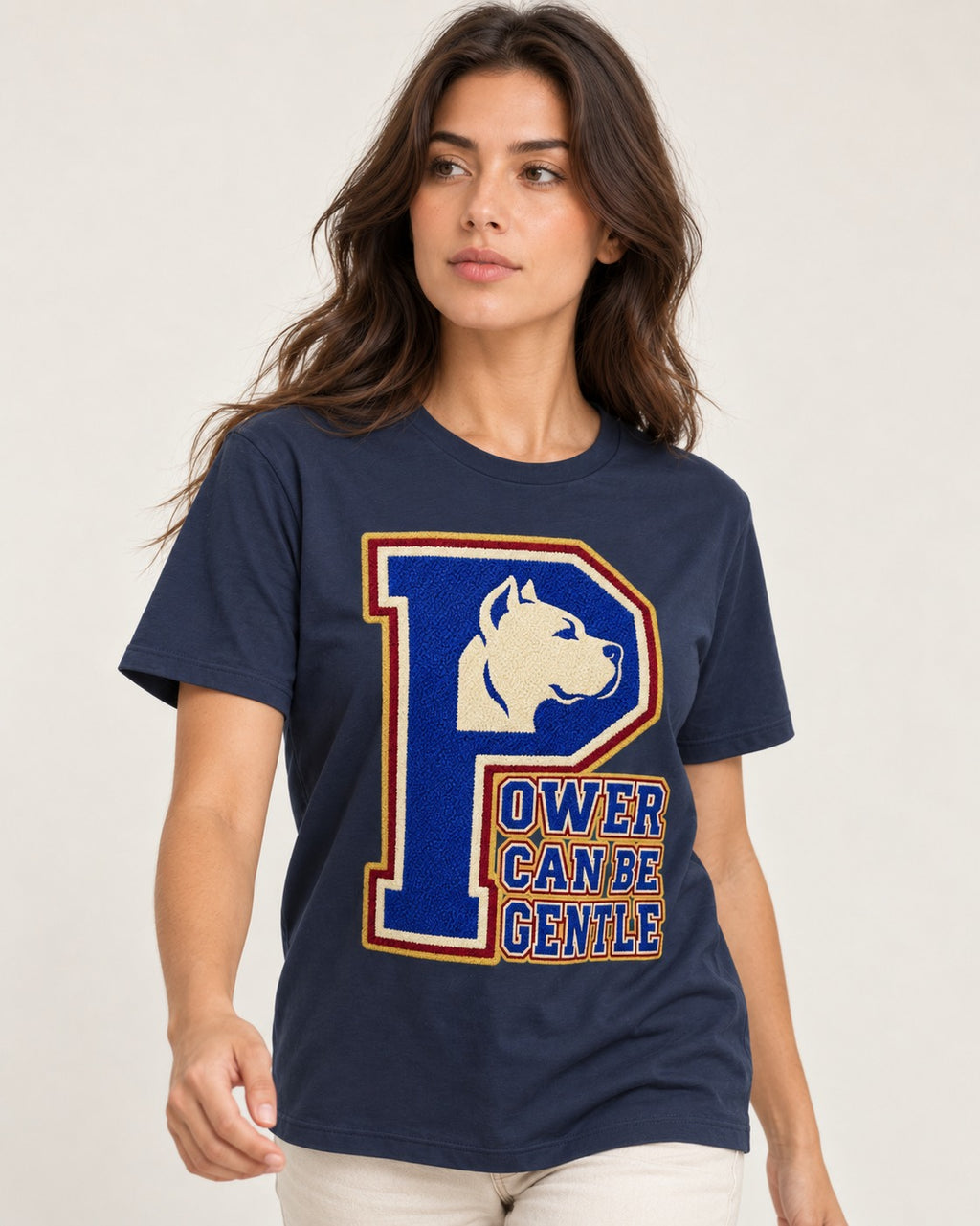 Pitbull Power Can Be Gentle Varsity Graphic T-Shirt in Navy, worn by a model