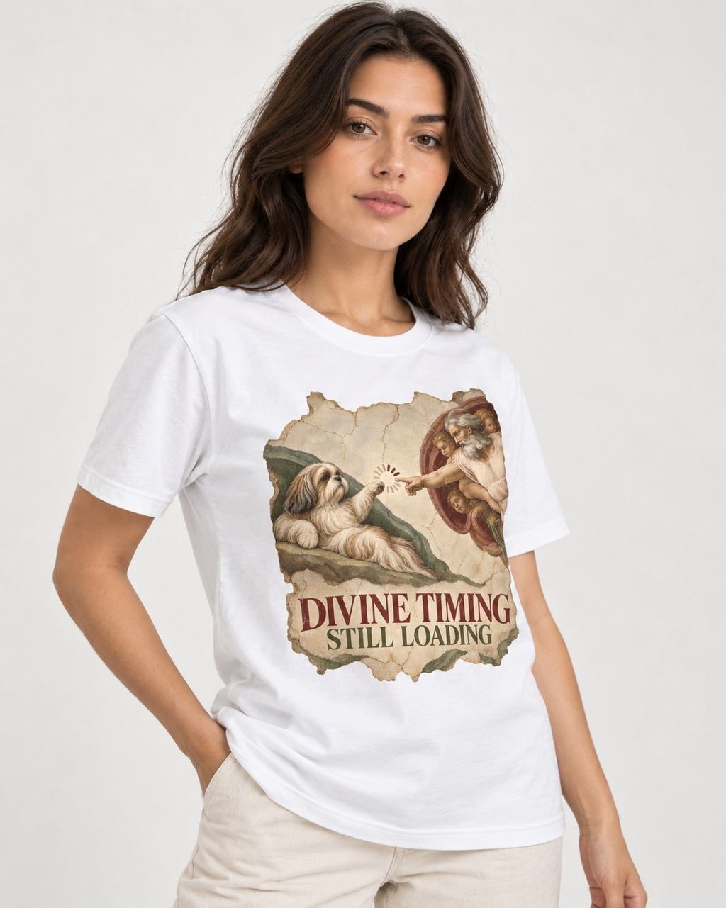 Shih Tzu Divine Timing Still Loading Renaissance Parody Graphic T-Shirt in White, worn by a model