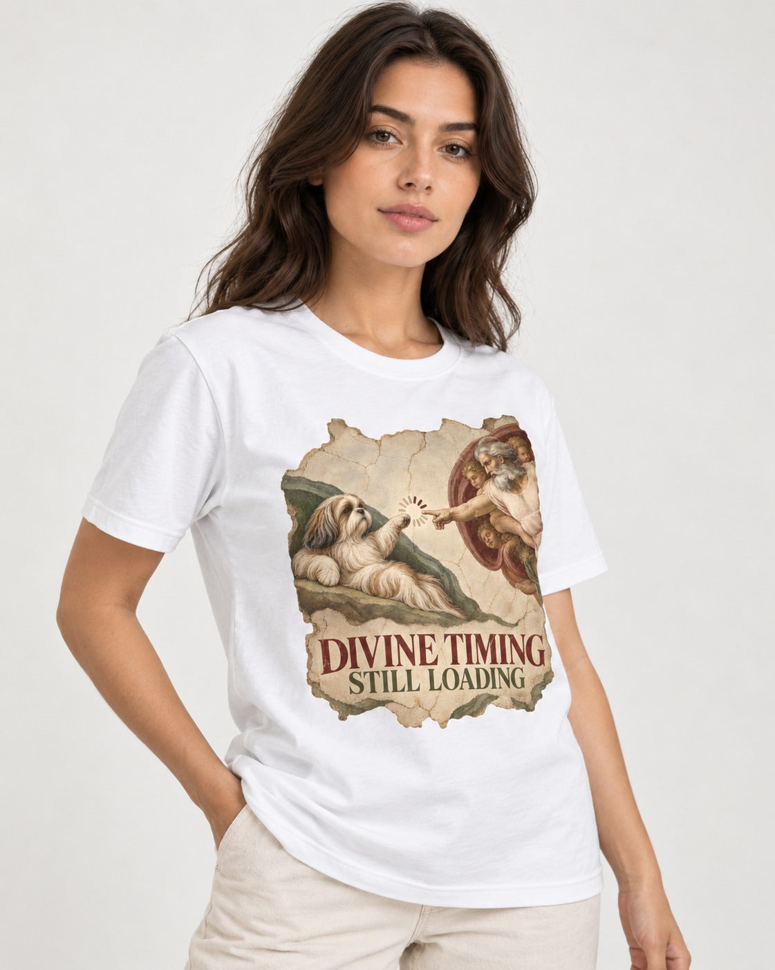 Shih Tzu Divine Timing Still Loading Renaissance Parody Graphic T-Shirt in White, worn by a model