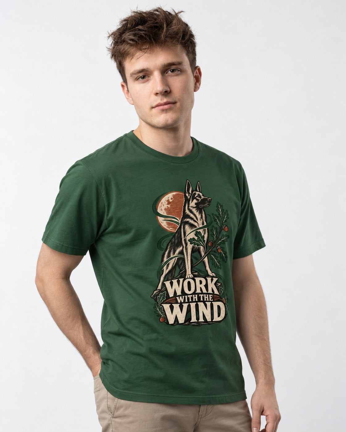Work With The Wind Botanical Woodcut German Shepherd Dog Graphic T-Shirt in Forest Green, worn by a model
