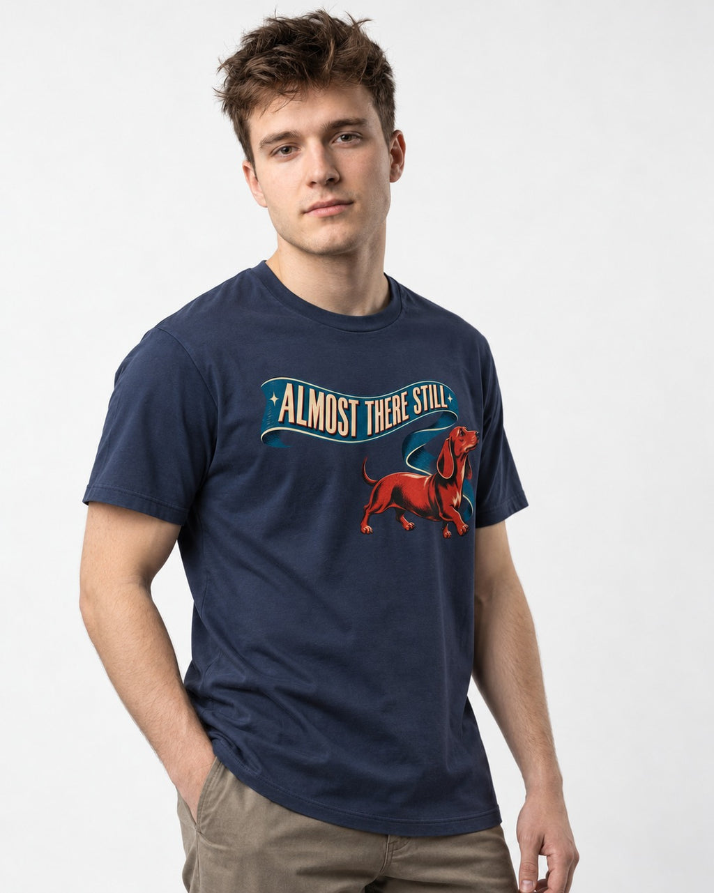Dachshund Almost There Still Ribbon Graphic T-Shirt in Navy, worn by a model