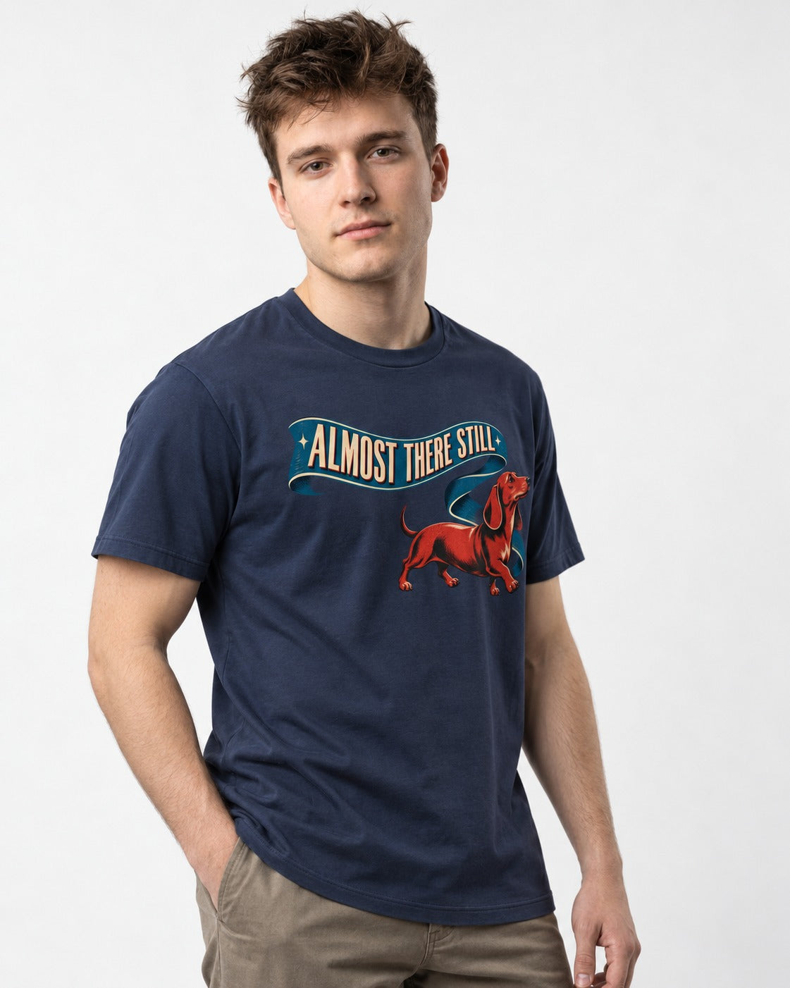 Dachshund Almost There Still Ribbon Graphic T-Shirt in Navy, worn by a model