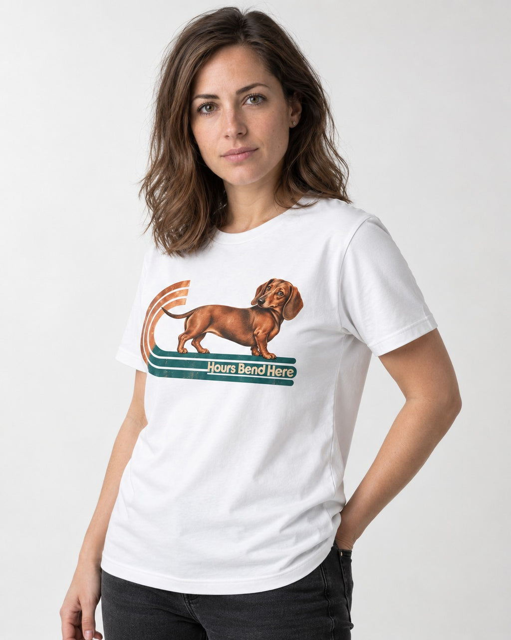 Dachshund Hours Bend Here Retro Track Graphic T-Shirt in White, worn by a model