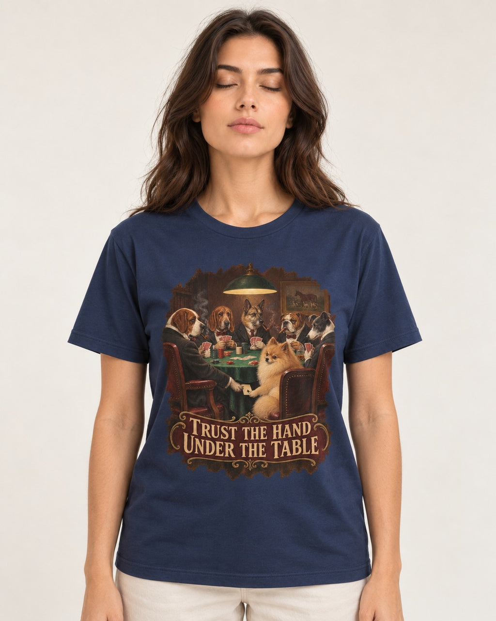 Pomeranian Trust the Hand Under the Table Poker Dogs Graphic T-Shirt in Navy, worn by a model