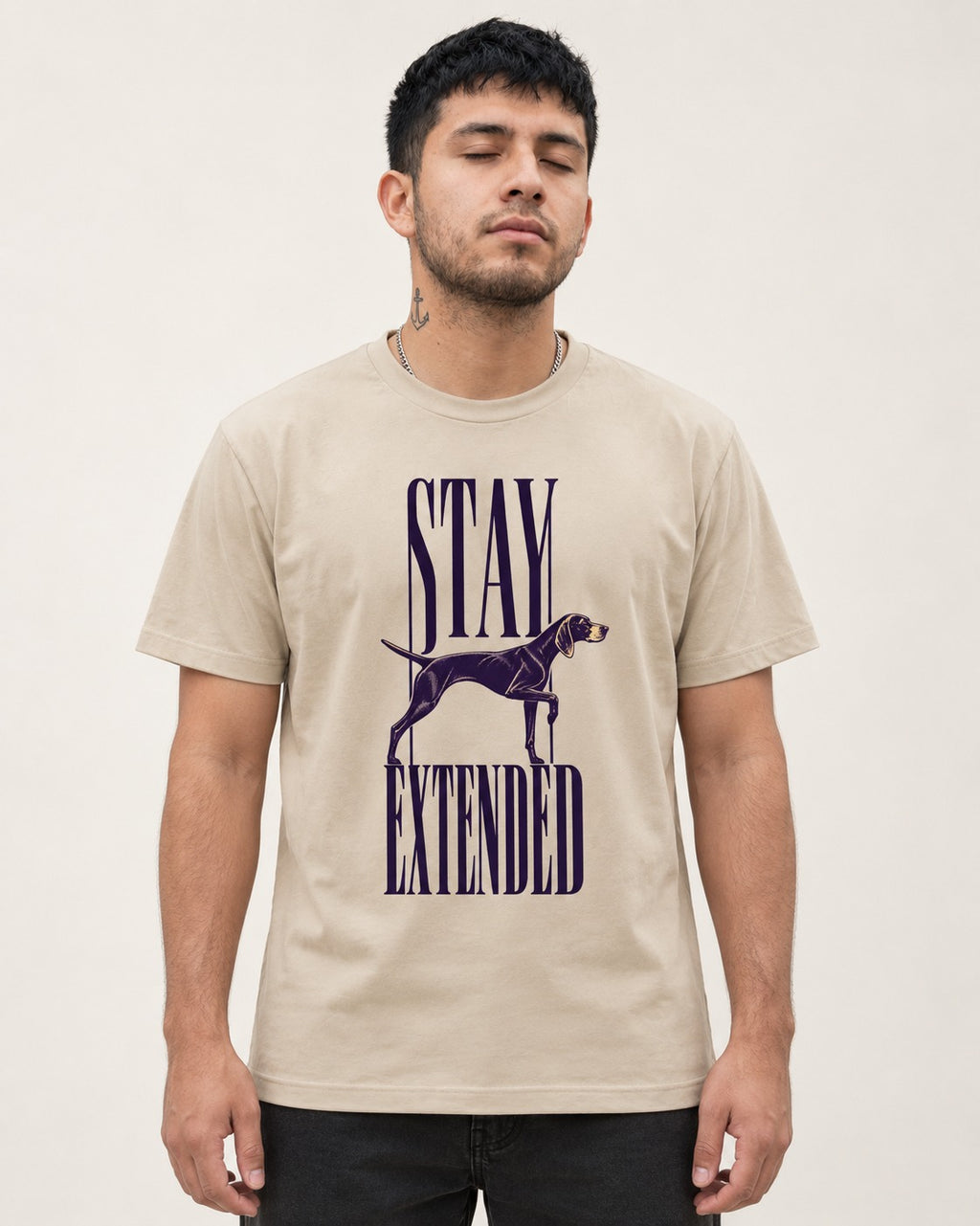 Stay Extended German Shorthaired Pointer T-Shirt in Sand, worn by a model