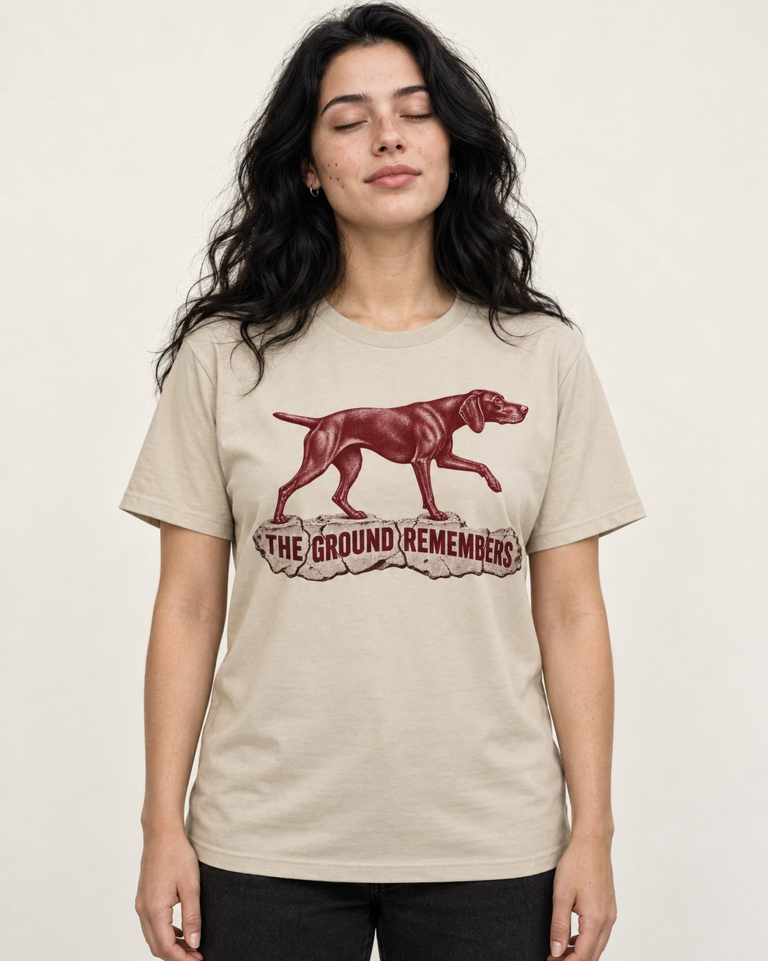 The Ground Remembers German Shorthaired Pointer T-Shirt in Sand, worn by a model