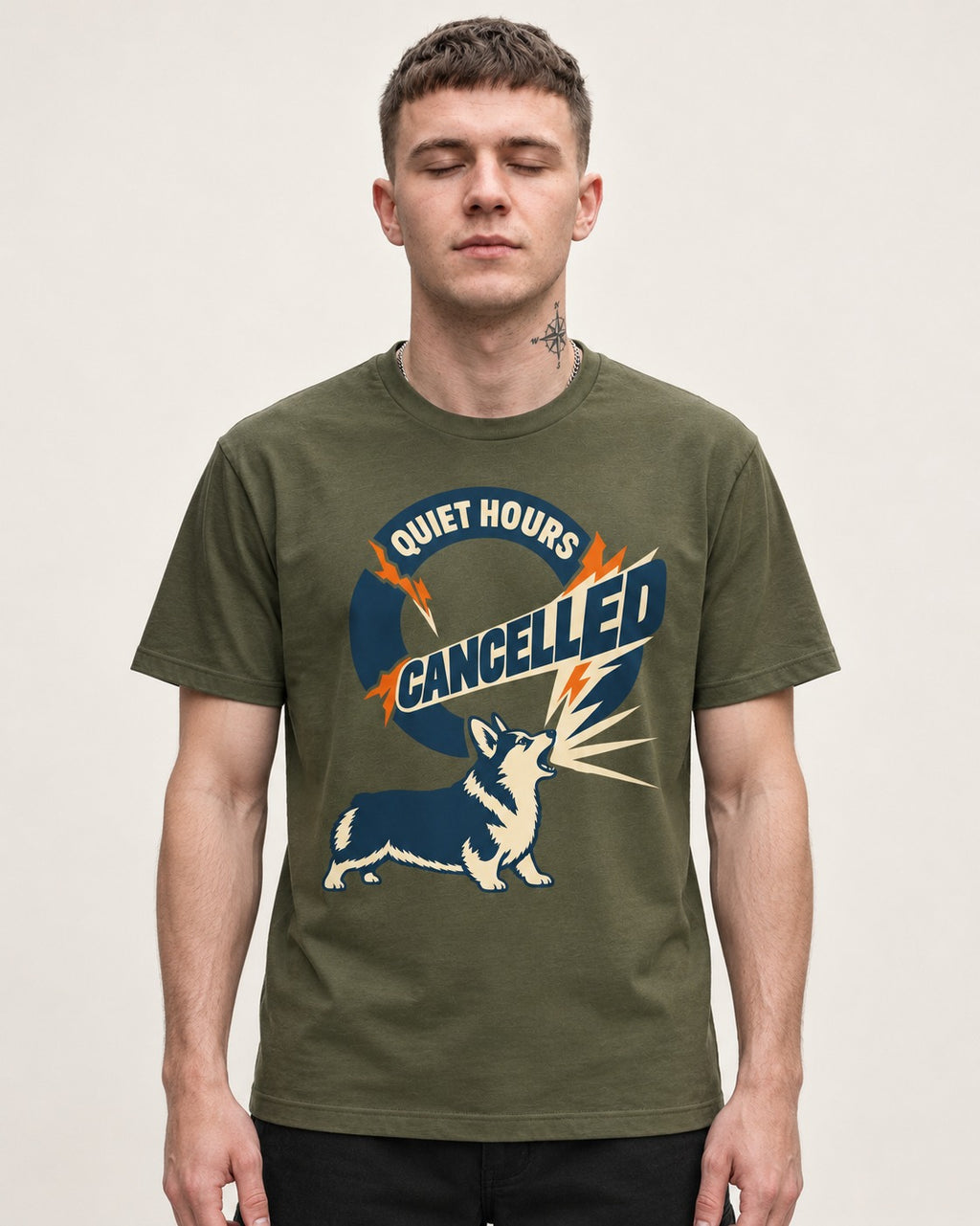 Corgi Quiet Hours Cancelled Calling Badge Graphic T-Shirt in Heather Military Green, worn by a model
