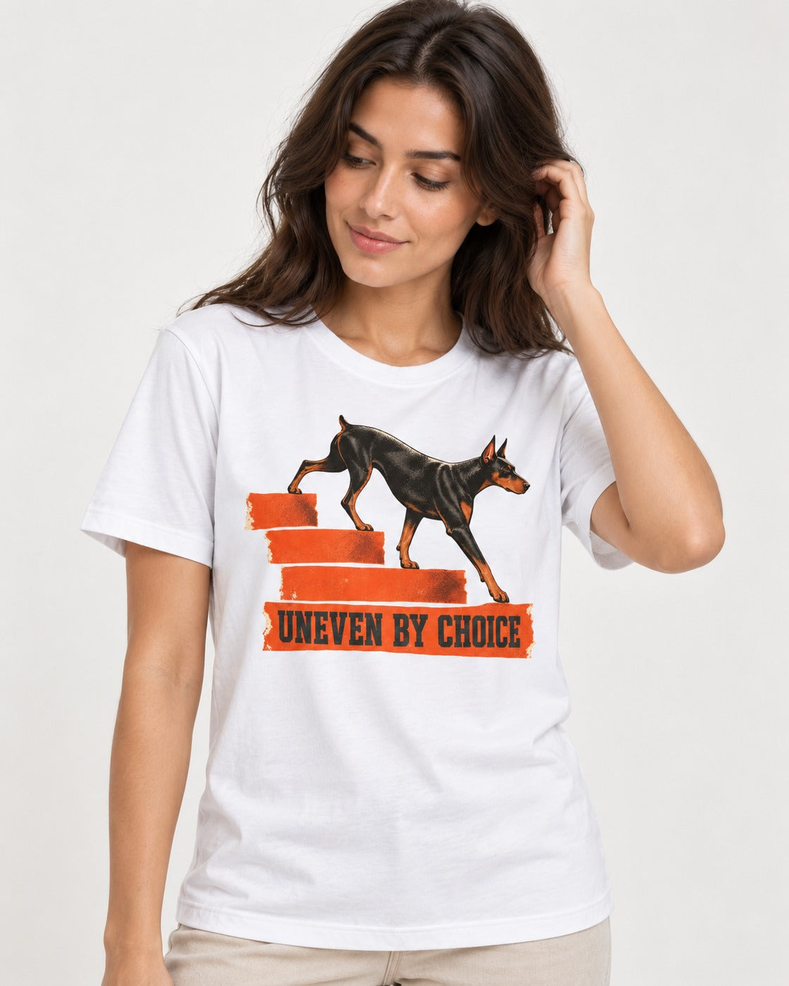 Doberman Uneven by Choice Stair Graphic T-Shirt in White, worn by a model