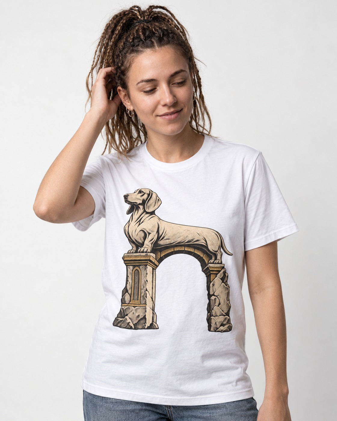 Dachshund Ruined Stone Arch Monument Graphic T-Shirt in White, worn by a model
