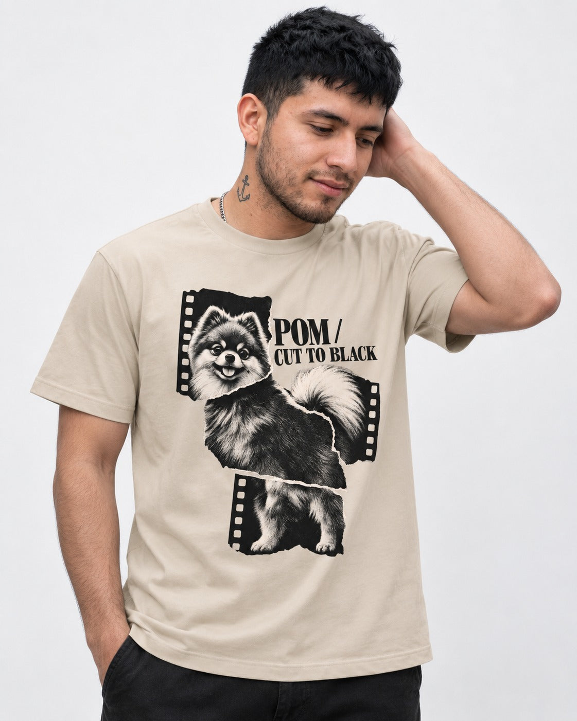 Pomeranian Cut to Black T-Shirt in Sand, worn by a model